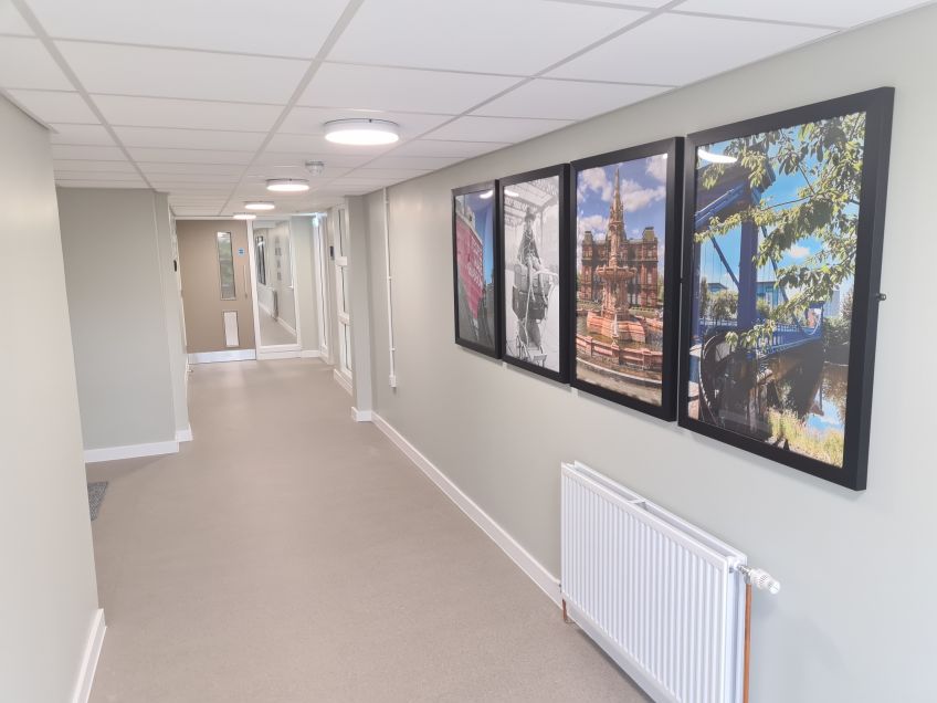 Images of Glasgow on walls of Bellrock St Livingwell complex 